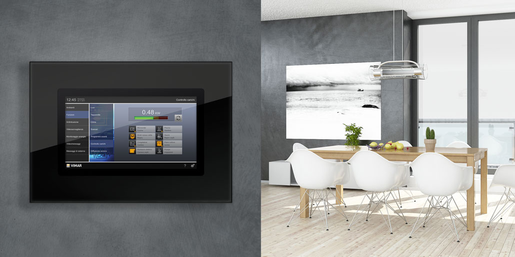 Vimar Webserver Byme home automation responsive multiplatform via web interface design quickpartners on wall mounted multimedia display with loadcontrol in modern diningroom
